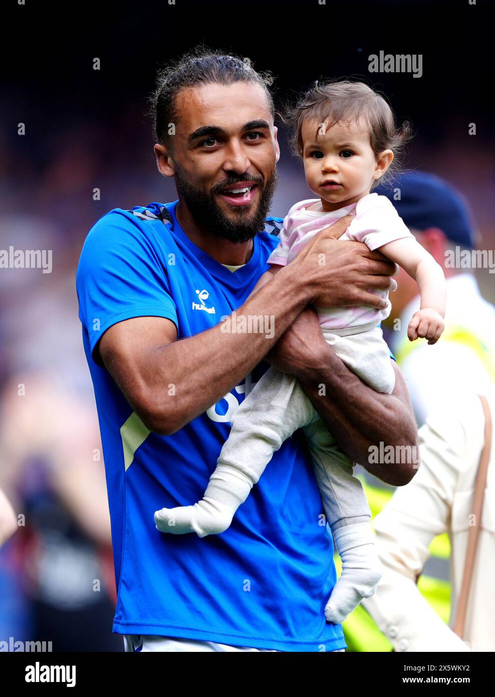 Everton's Dominic Calvert-Lewin and his child at the end of the Premier League match at Goodison Park, Liverpool. Picture date: Saturday May 11, 2024. Stock Photo