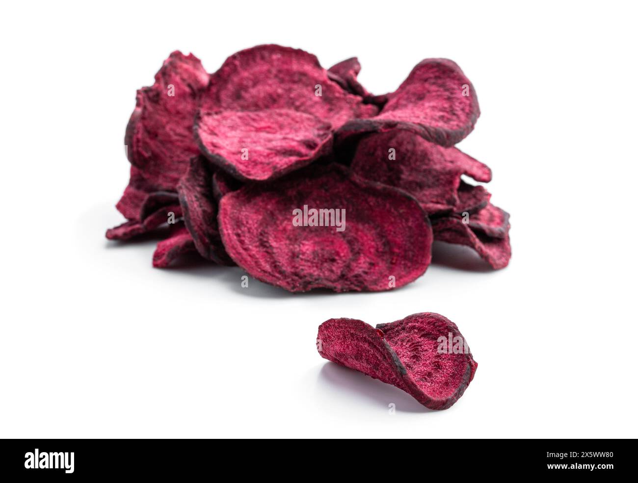Dried  beetroot chips isolated on white background Stock Photo