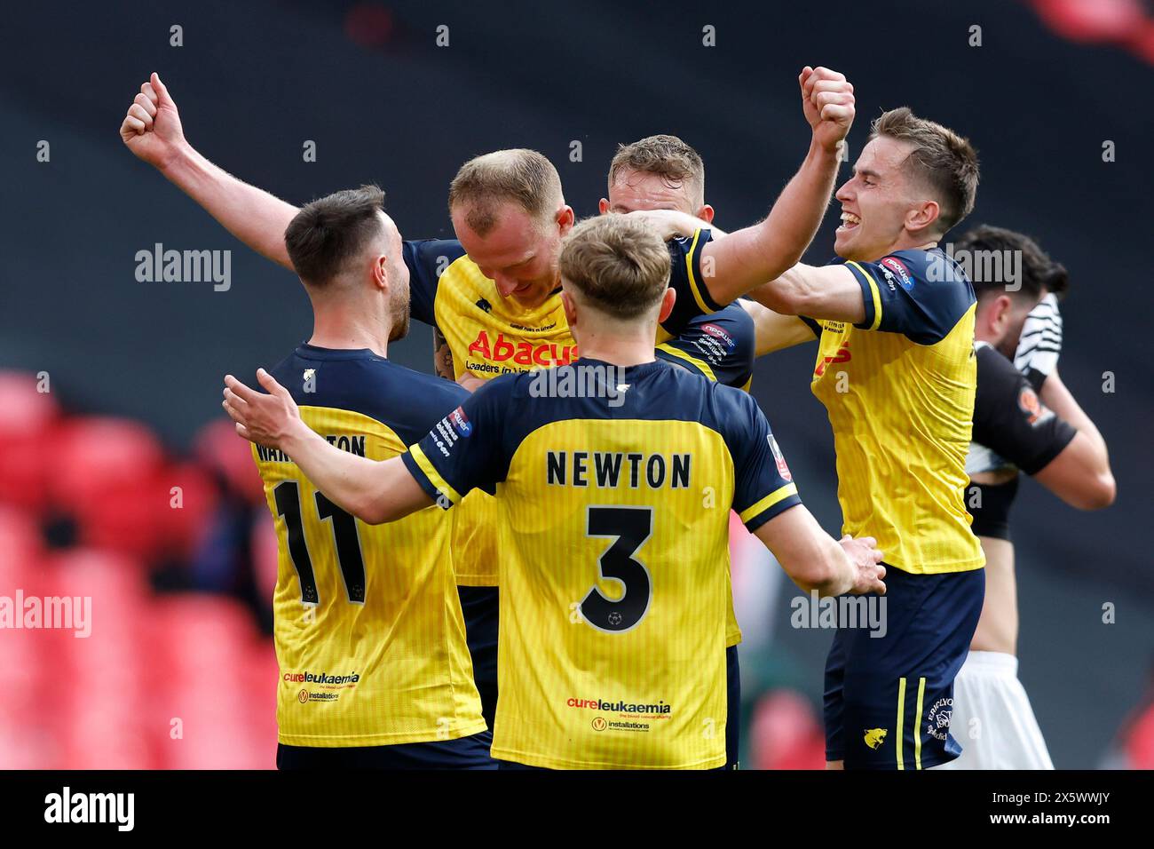 Solihull Moors's Mark Beck (centre) celebrates scoring their side's