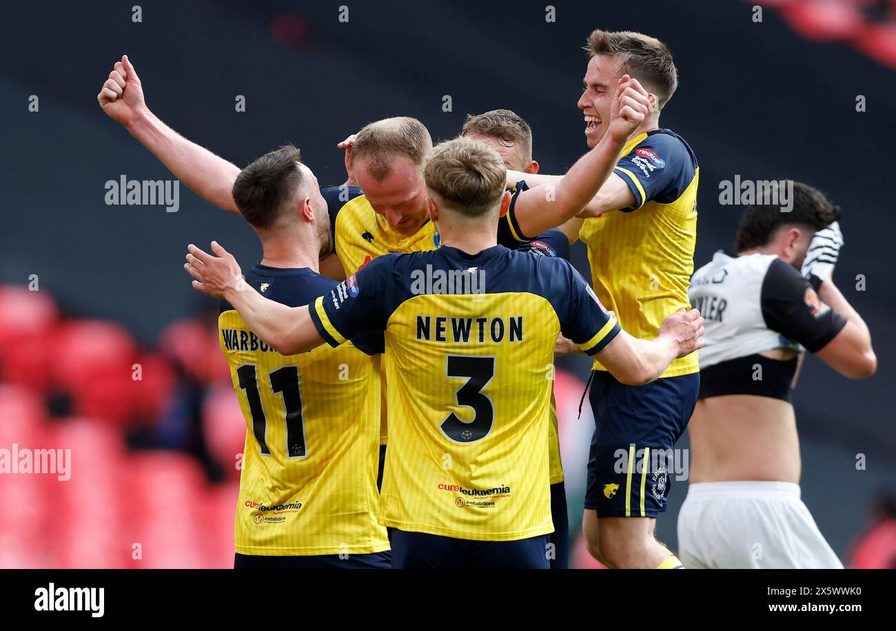 Solihull Moors's Mark Beck (centre) celebrates scoring their side's