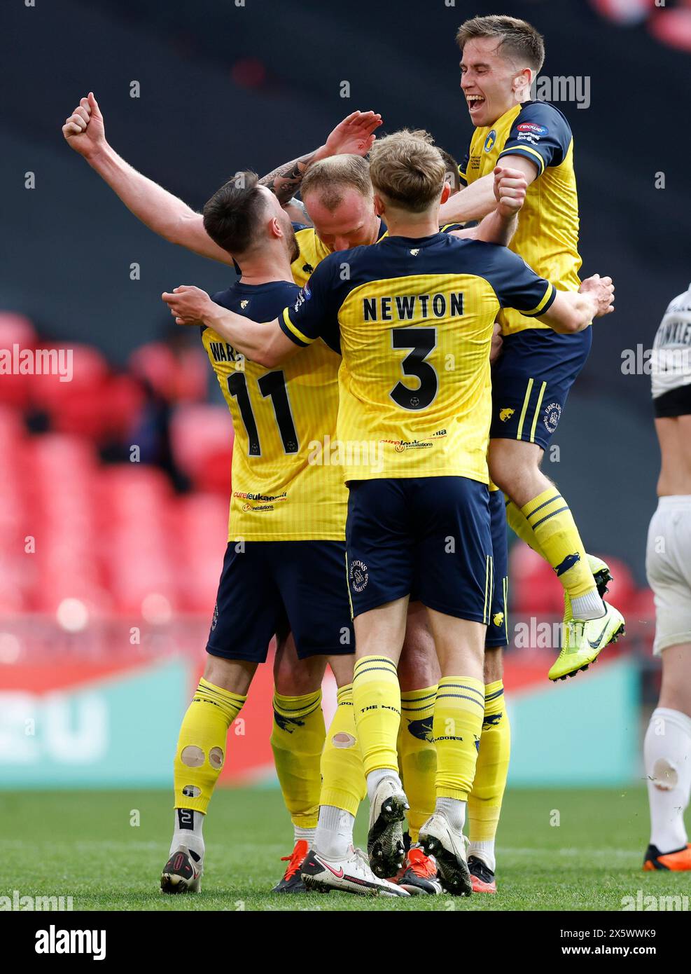 Solihull Moors's Mark Beck (centre) celebrates scoring their side's
