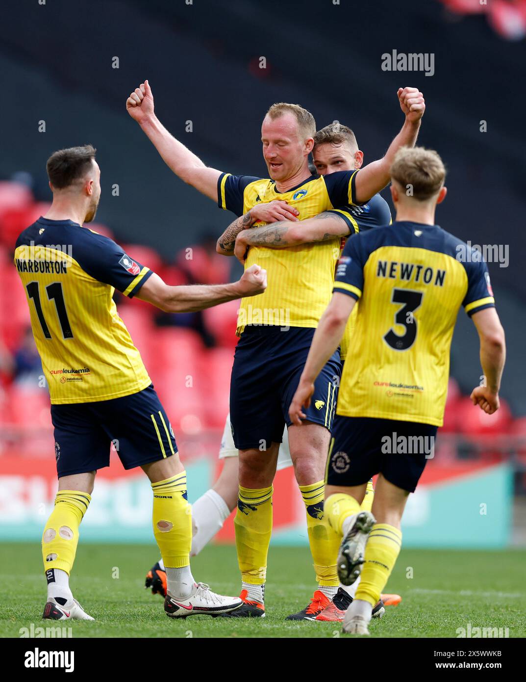 Solihull Moors's Mark Beck (centre) celebrates scoring their side's