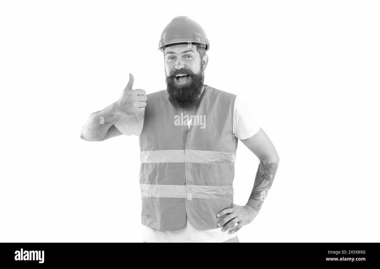 surprised bearded supervisor man in orange vest. studio shot of supervisor man wearing helmet Stock Photo