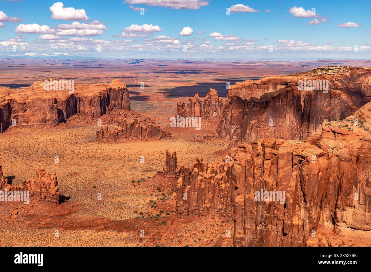 Rugged Monument Valley at secluded Hunt's Mesa with iconic butte, spire and mitten formations used as a backdrop in many old western movies. Stock Photo