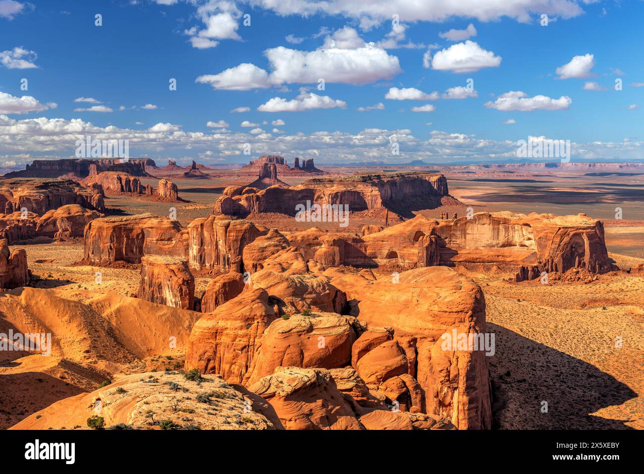 Rugged Monument Valley at secluded Hunt's Mesa with iconic butte, spire and mitten formations used as a backdrop in many old western movies. Stock Photo
