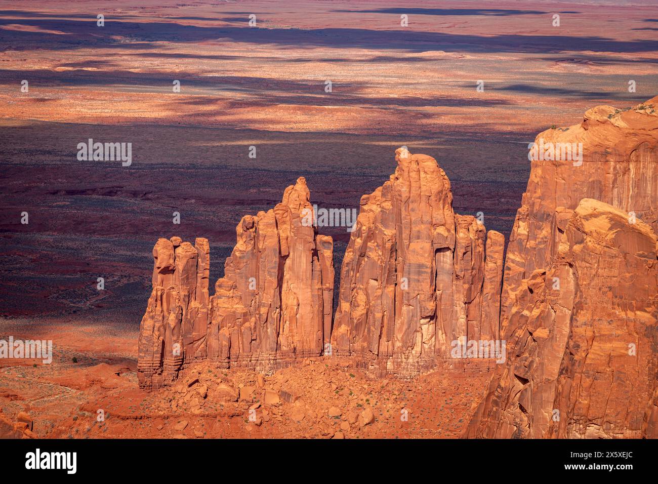 Rugged Monument Valley at Hunt's Mesa with iconic butte, spire and mitten formations used as a backdrop in many old western movies. Stock Photo