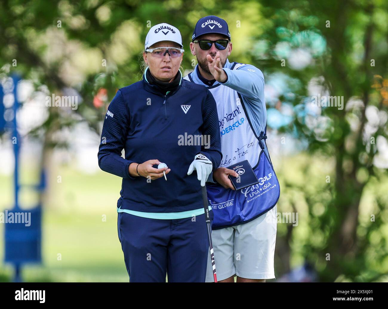 Clifton, NJ, USA. 11th May, 2024. Perrine Delacour of France surveys the fairway with her caddie during the third round at the Cognizant Founders Cup at the Upper Montclair Country Club in Clifton, NJ. Mike Langish/CSM (Credit Image: © Mike Langish/Cal Sport Media) (Credit Image: © Mike Langish/Cal Sport Media). Credit: csm/Alamy Live News Stock Photo