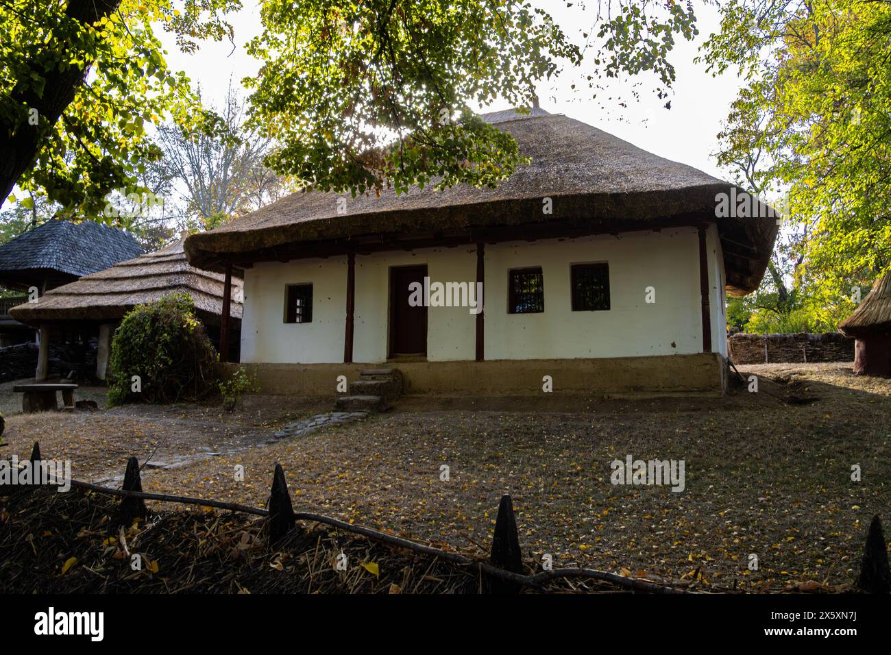 Old traditional house at the Dimitrie Gusti Village Museum, an open air museum in Bucharest, Romania Stock Photo