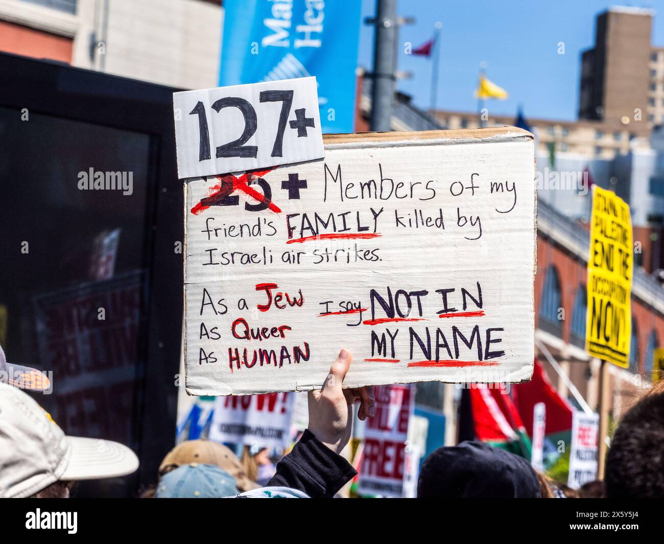 May 11, 2024, New York, New York, USA: A sign that denotes how many people of a family have died in Gaza from Israeli air strikes is held up. Gathering at Barclays Center, Brooklyn, NY, for a Pro-Palestinian rally on Nakba Day of Action where hundreds marched towards the Manhattan Bridge. Amid arrests and NYPD maneuvers, groups separated and converged, echoing the Palestinian plight and making the NYPD confused on where to go. Nakba, Arabic for 'catastrophe, ' symbolizes the Palestinian displacement post-1948 Arab-Israeli War. (Credit Image: © Carlos Chiossone/ZUMA Press Wire) EDITORIAL USAGE  Stock Photo