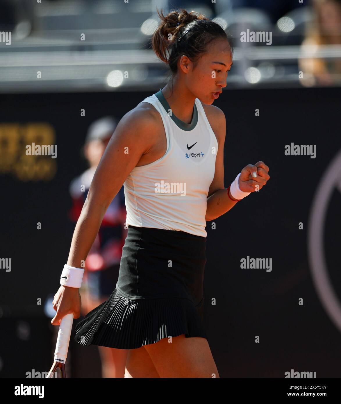 Rome, Italy. 11th May, 2024. Zheng Qinwen of China reacts during women's singles round of 32 match against Linda Noskova of the Czech Republic at the WTA Italian Open in Rome, Italy, May 11, 2024. Credit: Li Jing/Xinhua/Alamy Live News Stock Photo