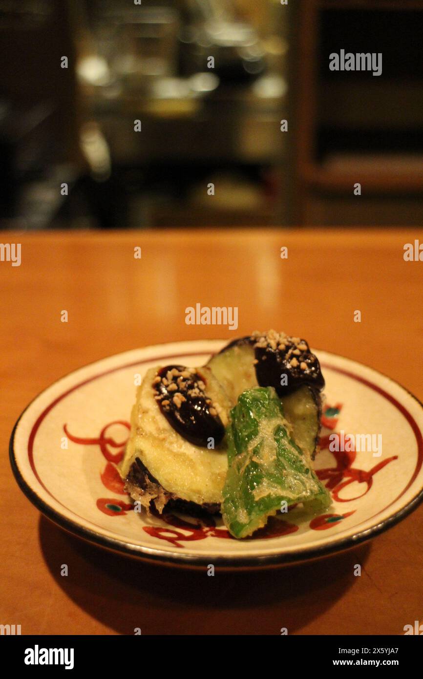 Japanese cuisine: eggplant and green pepper tempura Stock Photo