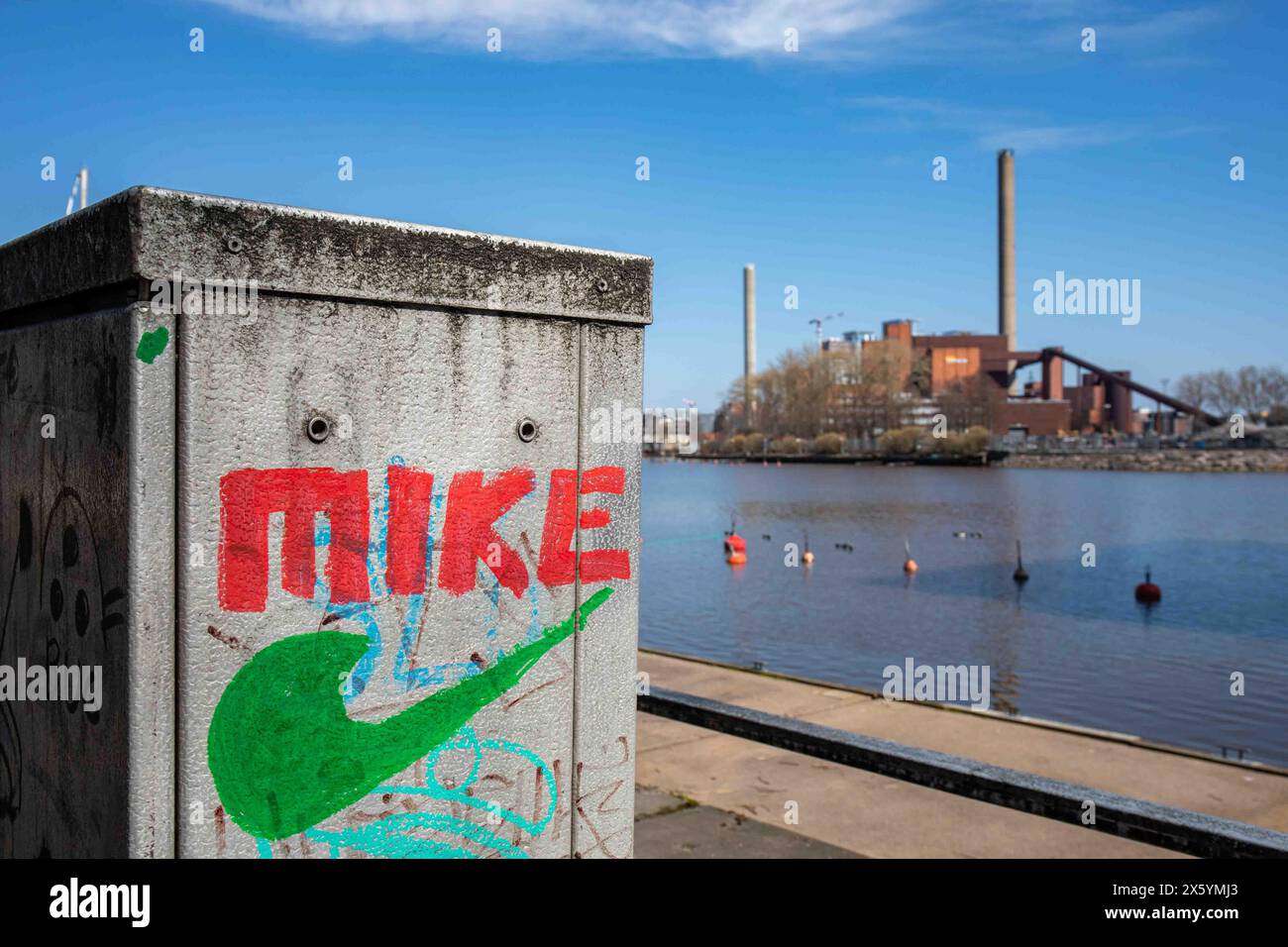 Mike painted on a electric cabinet resembling Nike logo in Marihaka district of Helsinki, Finland Stock Photo