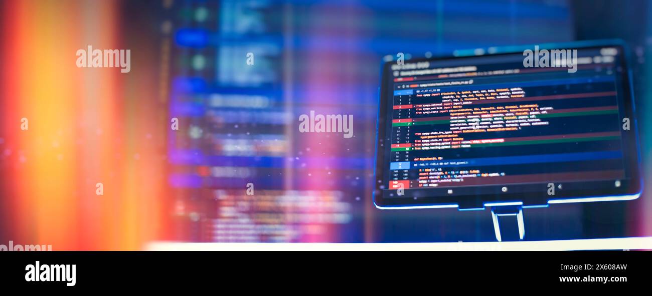 Work from home. Programmer coding code on notebook screen at Stock ...
