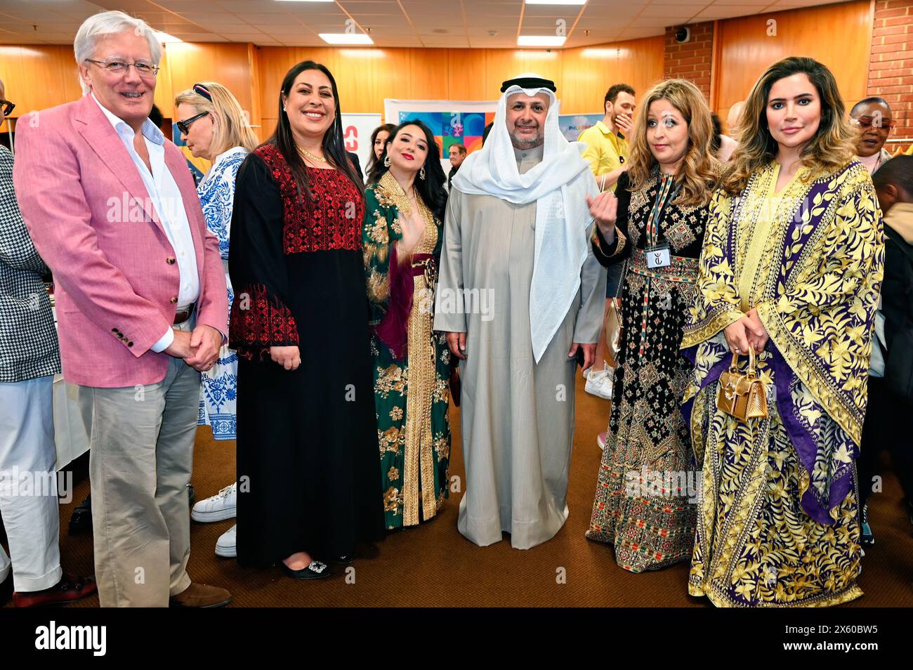 Kensington Town Hall, LONDON, ENGLAND, UK - MAY 11 2024: H.E. Bader Mohammad Alawadi, Ambassador of the State of Kuwait attends The Young Diplomats in London (YDL) are presenting a charity event called 'Weaving International Fashion - National Dress Catwalk'. representing over 17 embassies in the, each reflecting its unique cultural heritage. The Young Diplomats in London Fashion Show got it right. In this era of immigration, every culture is proud of the tradition represented by its own men and women. People should think twice before choosing to emigrate. As an immigrant, we have given up our Stock Photo