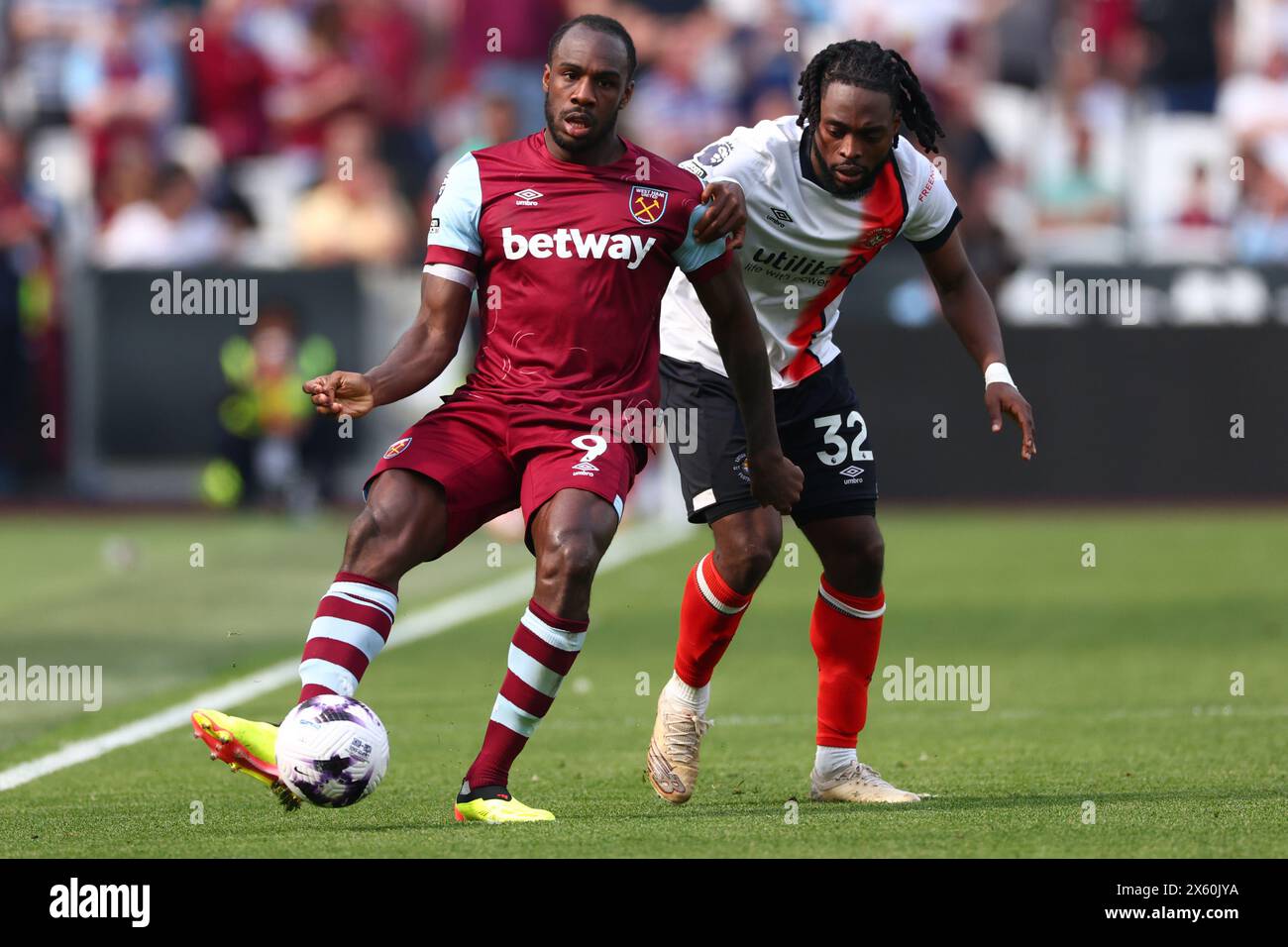 London Stadium, London, UK. 11th May, 2024. Premier League Football, West Ham United versus Luton Town; Michail Antonio of West Ham United is under pressure from Fred Onyedinma of Luton Town Credit: Action Plus Sports/Alamy Live News Stock Photo