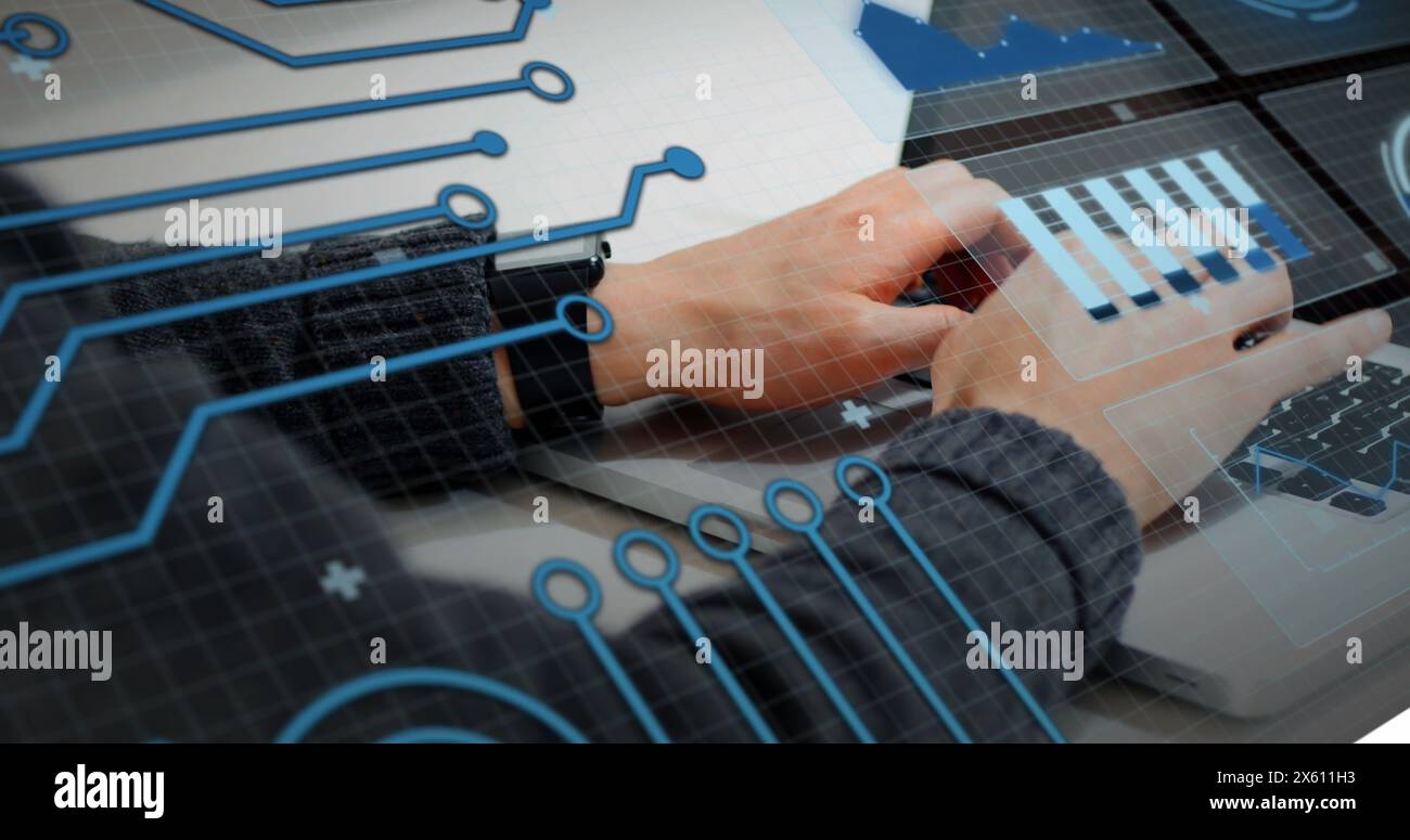 Image of graphs, circles and circuit board pattern over caucasian man working on laptop Stock Photo