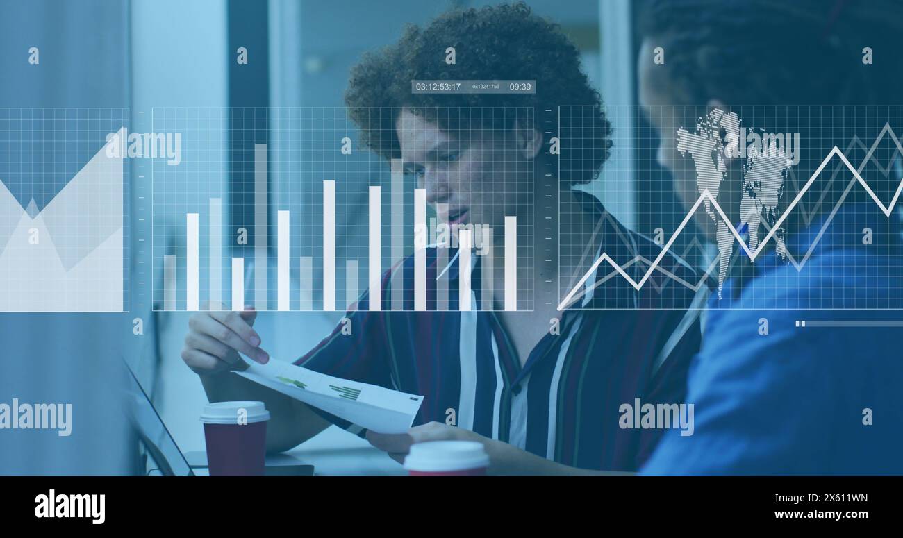 Image of statistical data processing over two diverse man discussing over a document at office Stock Photo