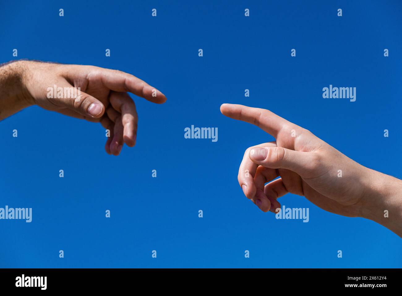photo of two hands. Hands reach for each other Stock Photo