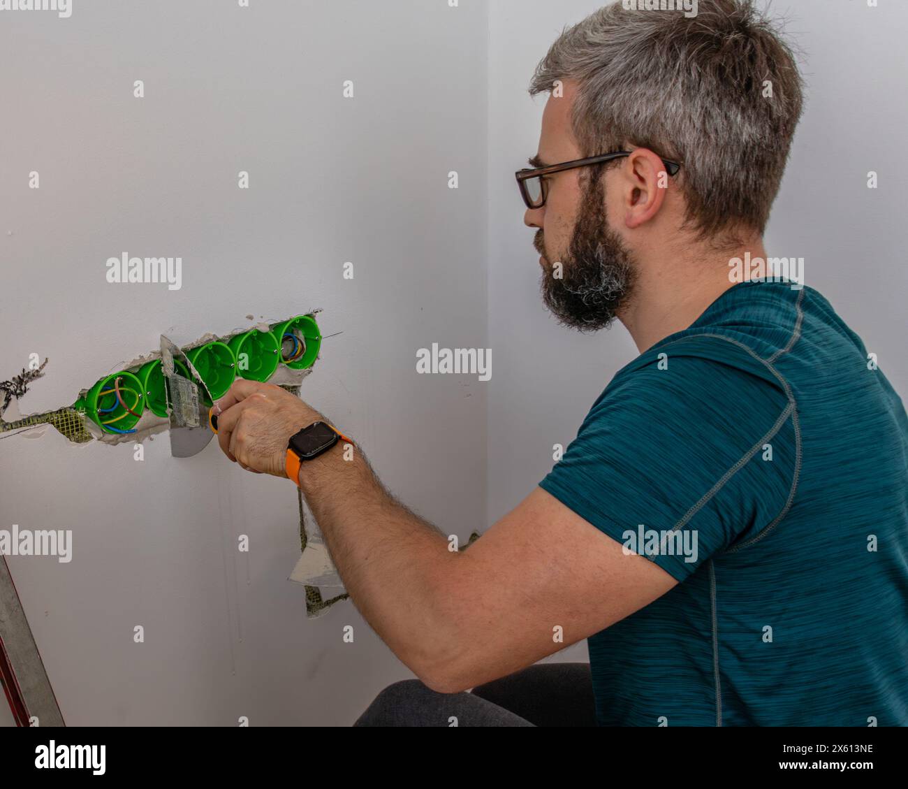 Male worker professional mounts hi-res stock photography and images - Alamy