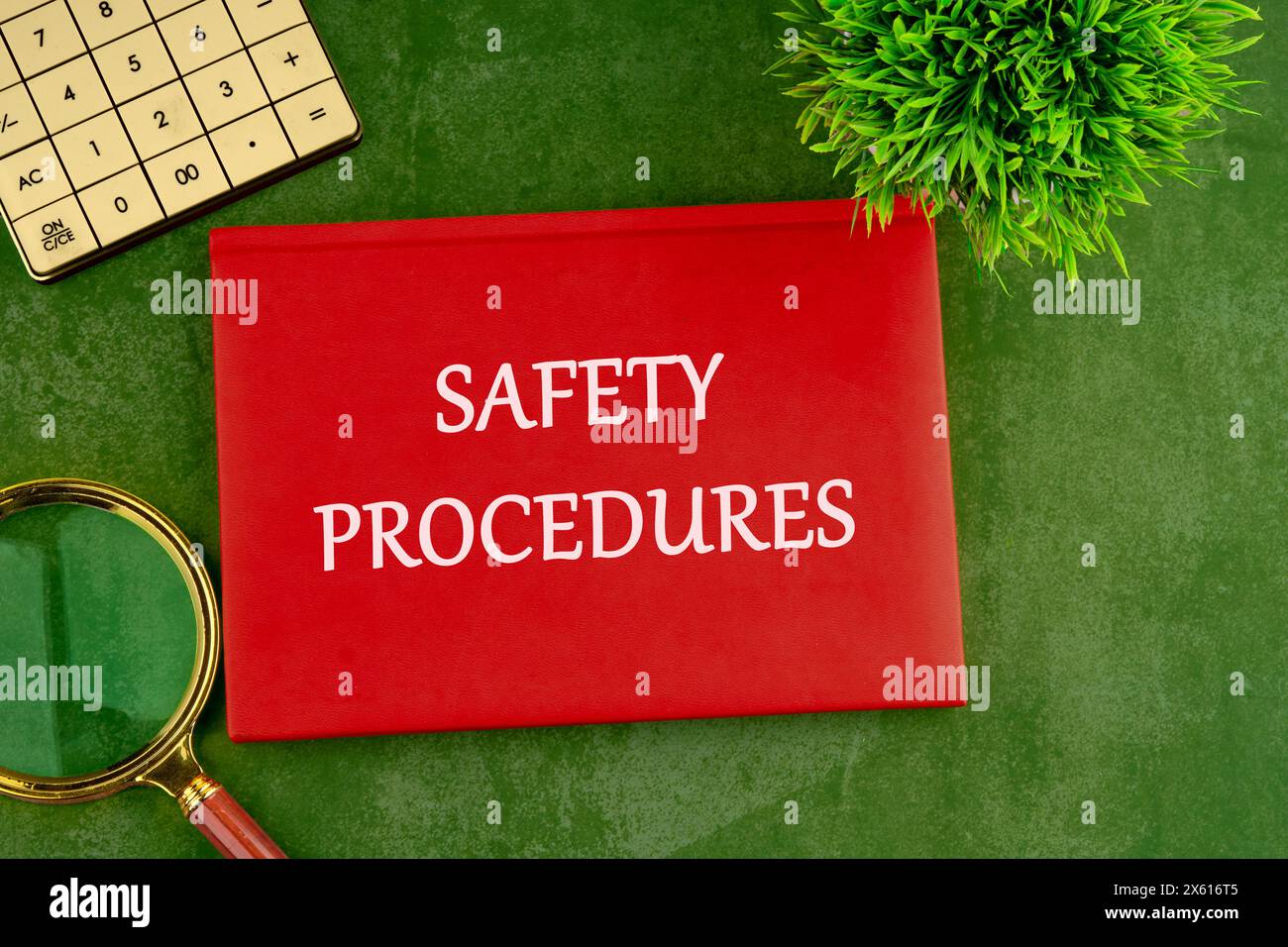 SAFETY PROCEDURES text written on the cover of a business notebook on a