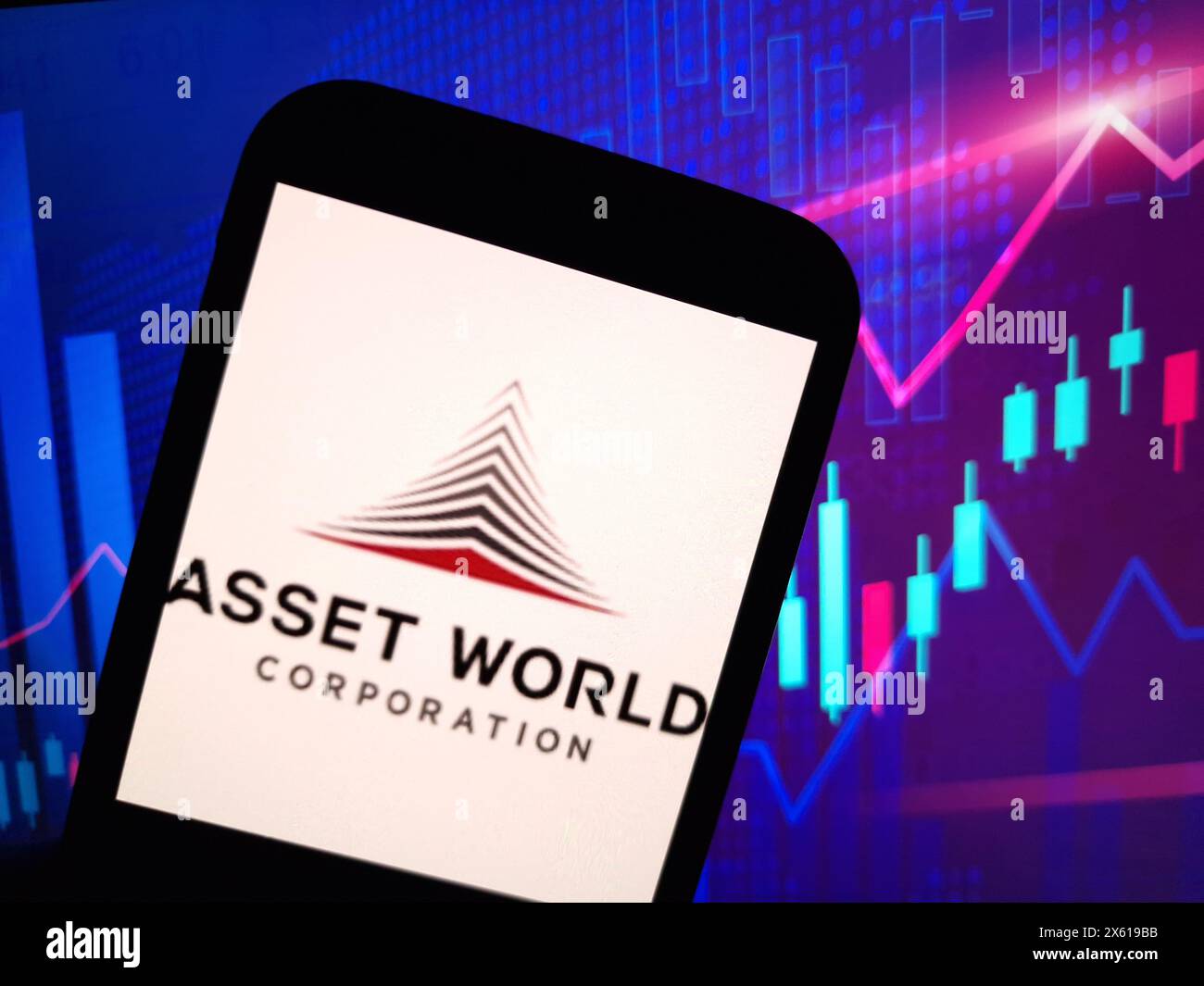 Konskie, Poland - May 11, 2024: Asset World Corporation logo displayed on mobile phone Stock Photo