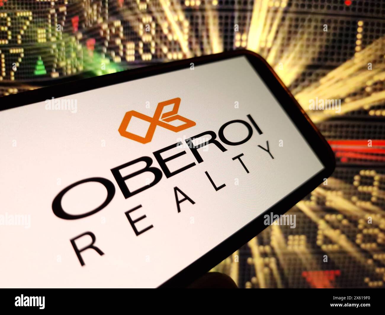 Konskie, Poland - May 11, 2024: Oberoi Realty company logo displayed on mobile phone Stock Photo