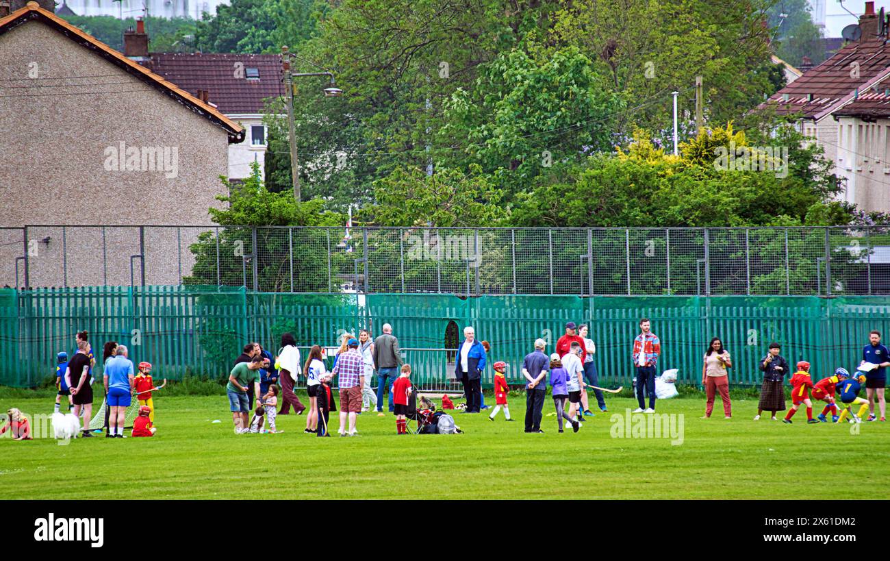 Glasgow, Scotland, UK. 12th May, 2024: UK Weather: Sunday sports  at  peterson park  for parents and children. Sunny for locals and tourists in the centre the city as temperatures rise to summer levels. Credit Gerard Ferry/Alamy Live News Stock Photo