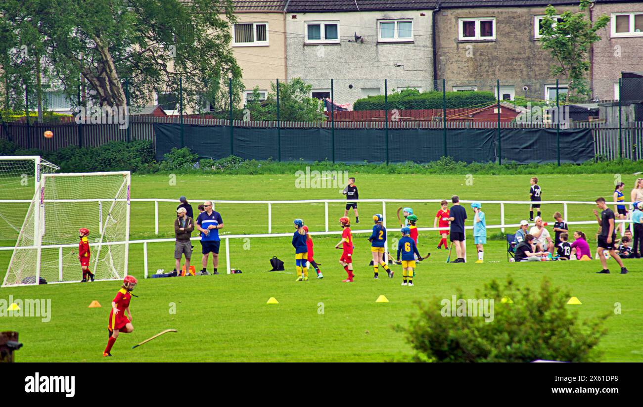 Glasgow, Scotland, UK. 12th May, 2024: UK Weather: Sunday sports  at  peterson park  for parents and children. Sunny for locals and tourists in the centre the city as temperatures rise to summer levels. Credit Gerard Ferry/Alamy Live News Stock Photo