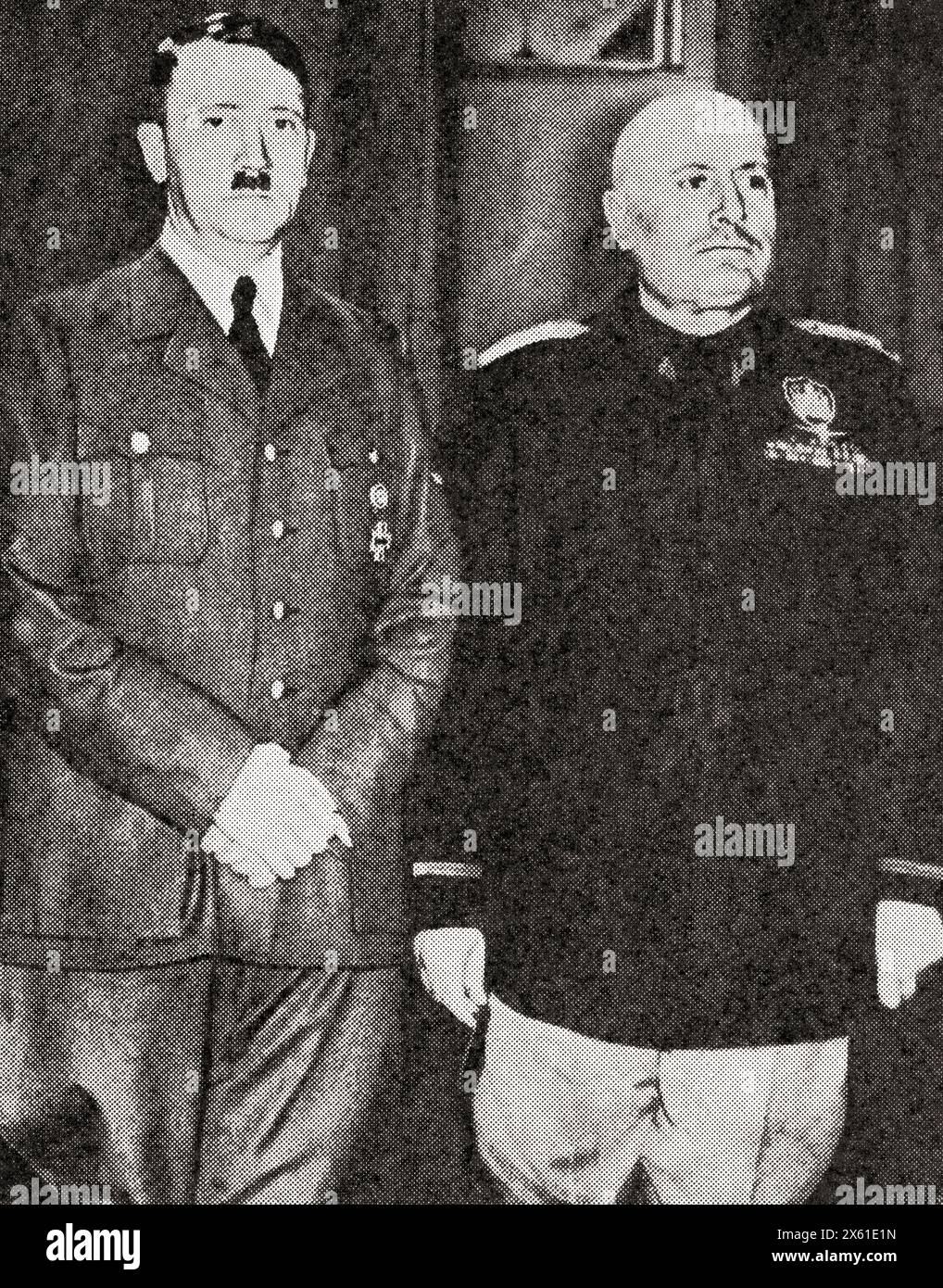 Hitler's meeting with Mussolini in an attempt to gain new allies, 23-28 October, 1940.  Adolf Hitler, 1889 – 1945. German politician, demagogue, Pan-German revolutionary, leader of the Nazi Party, Chancellor of Germany, and Führer of Nazi Germany from 1934 to 1945. Benito Amilcare Andrea Mussolini, 1883 – 1945. Italian dictator, journalist, founder and leader of the National Fascist Party (PNF), and Prime Minister of Italy.  From The War in Pictures, Sixth Year. Stock Photo