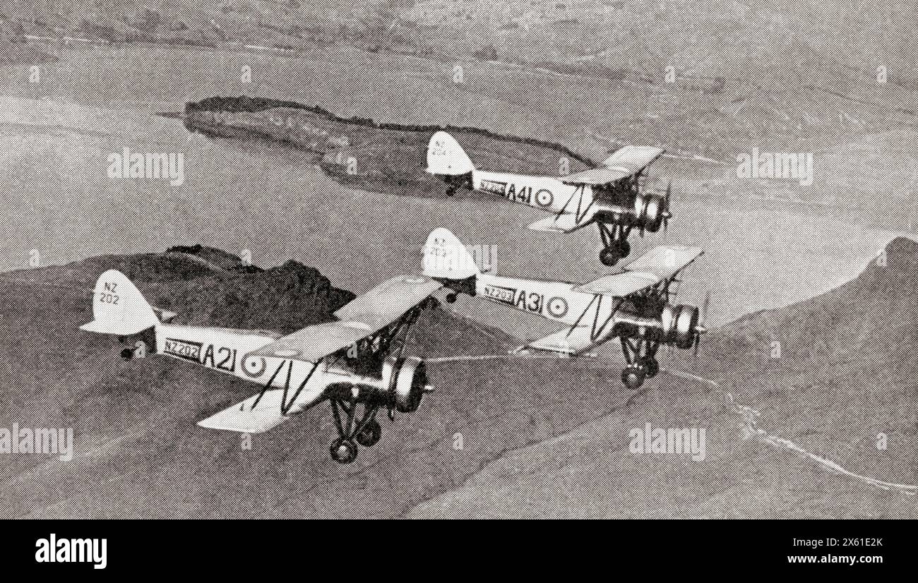 A flight of Avro training planes from New Zealand's own Air Force school at Wigram on a practice flight at the start of WWII. From The War in Pictures, First Year. Stock Photo