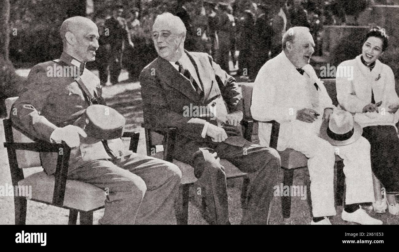 From left to right, Chiang Kai-Shek, President Roosevelt, Winston Churchill and Mme. Chiang Kai-Shek, seen here in North Africa, 1943. The meeting was for the purpose of issuing a statement on Allied policy regarding the war against Japan. Chiang Kai-shek, 1887 –1975. Chinese politician, revolutionary, and military leader of the Republic of China (ROC) and Generalissimo of the National Revolutionary Army.  Franklin Delano Roosevelt, 1882 – 1945, aka FDR.  American statesman, political leader and 32nd president of the United States.  Sir Winston Leonard Spencer-Churchill, 1874 –1965. Stock Photo