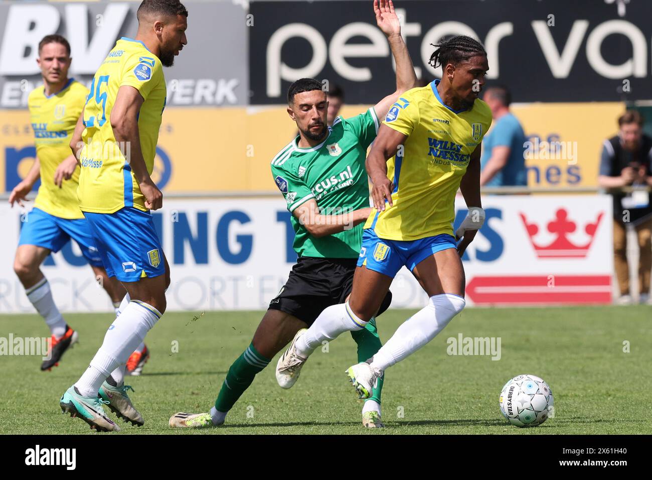Waalwijk, Netherlands. 12th May, 2024. WAALWIJK, NETHERLANDS - MAY 12: Godfried Roemeratoe of RKC Waalwijk with Younes Namli of PEC Zwolle during the Dutch Eredivisie match between RKC Waalwijk and PEC Zwolle at Mandemakers stadion on May 12, 2024 in Waalwijk, Netherlands. (Photo by Peter Lous/Orange Pictures) Credit: Orange Pics BV/Alamy Live News Stock Photo