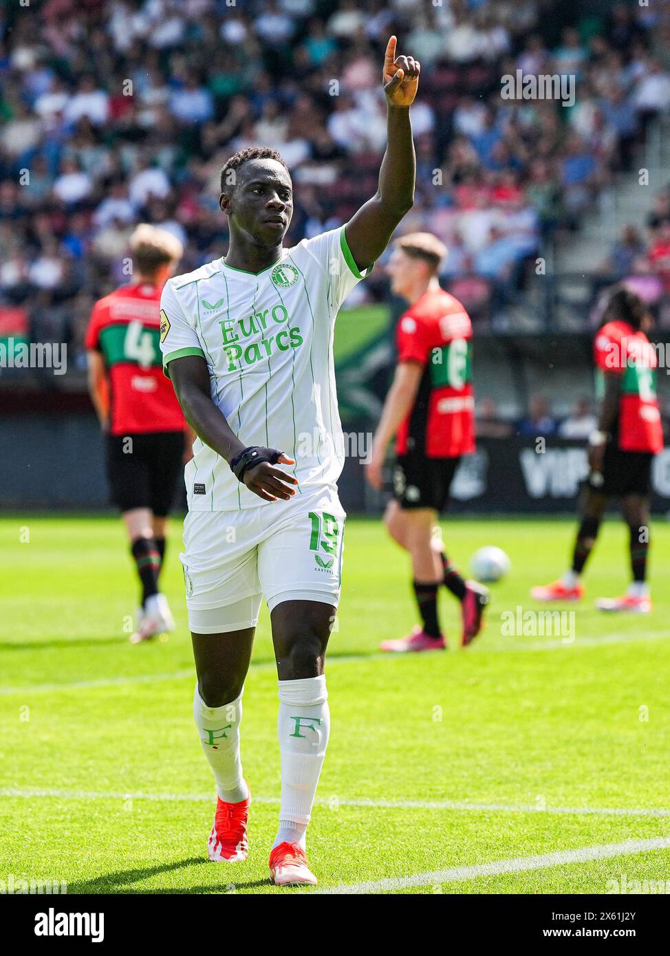 Nijmegen, The Netherlands. 12th May, 2024. Nijmegen - Yankuba Minteh of Feyenoord celebrates the 0-2 during the Eredivisie match between NEC v Feyenoord at Goffertstadion on 12 May 2024 in Nijmegen, The Netherlands. Credit: box to box pictures/Alamy Live News Stock Photo