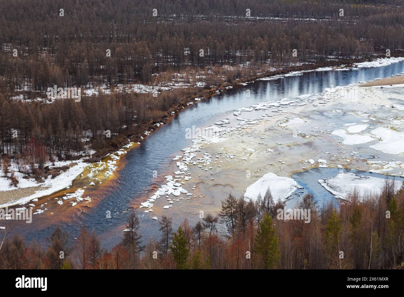 The beginning of ice drift on the Chulman River in South Yakutia, Russia. May 10, 2024 Stock Photo