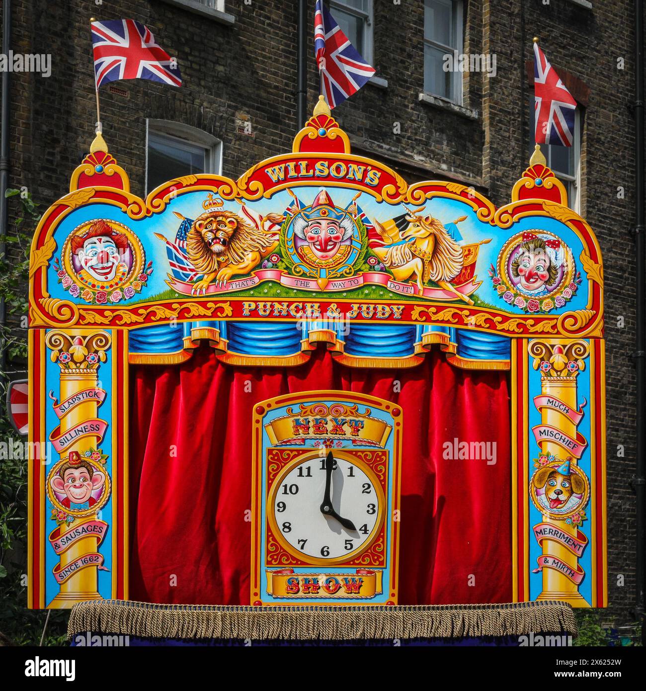 London, UK. 12th May, 2024. The afternoon seen a number of traditional and modern Punch and Judy shows entertain the crowds. Puppeteers from across the country gather for the annual May Fayre and Puppet Festival. It takes place in the grounds of St Paul's Church (also called The Actor's Church), Covent Garden and includes a church service, procession, Punch and Judy shows, workshops, stalls and family fun. Credit: Imageplotter/Alamy Live News Stock Photo