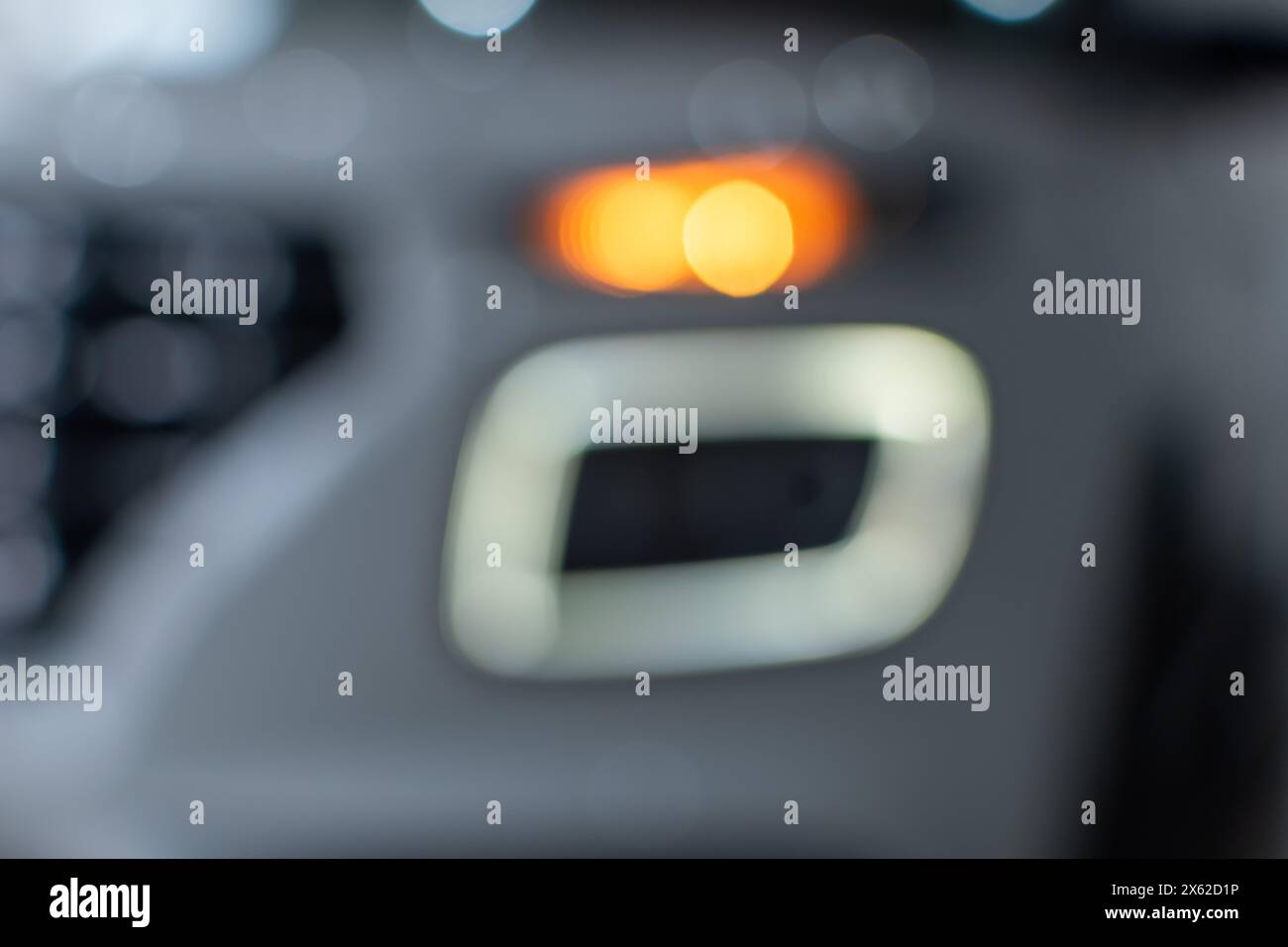 Blurred image of passenger car headlights switched on closeup Stock Photo Alamy