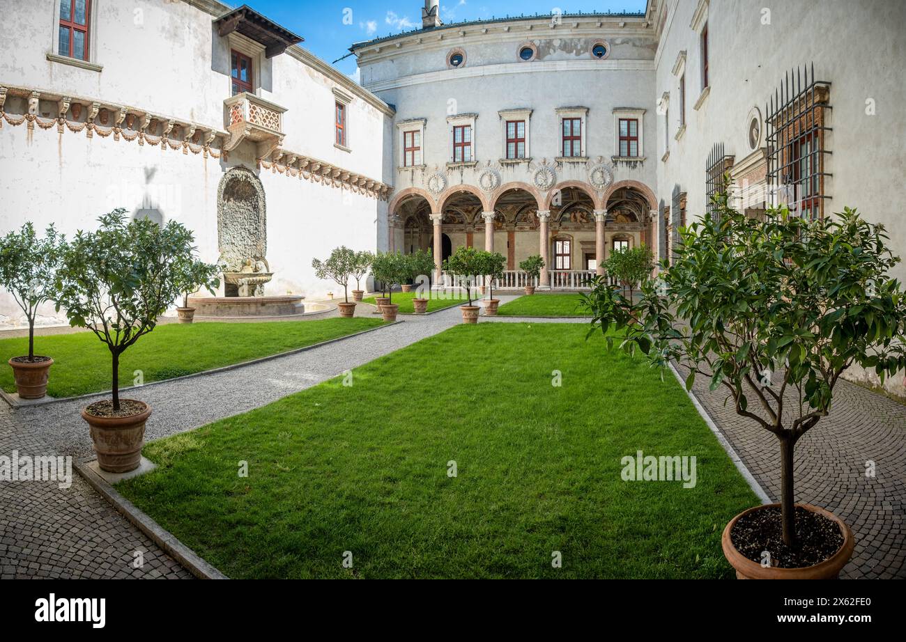 Internal garden with citrus trees of an ancient medieval palace - Trento, Trentino Alto Adige, Sudtirol region in Italy. Stock Photo