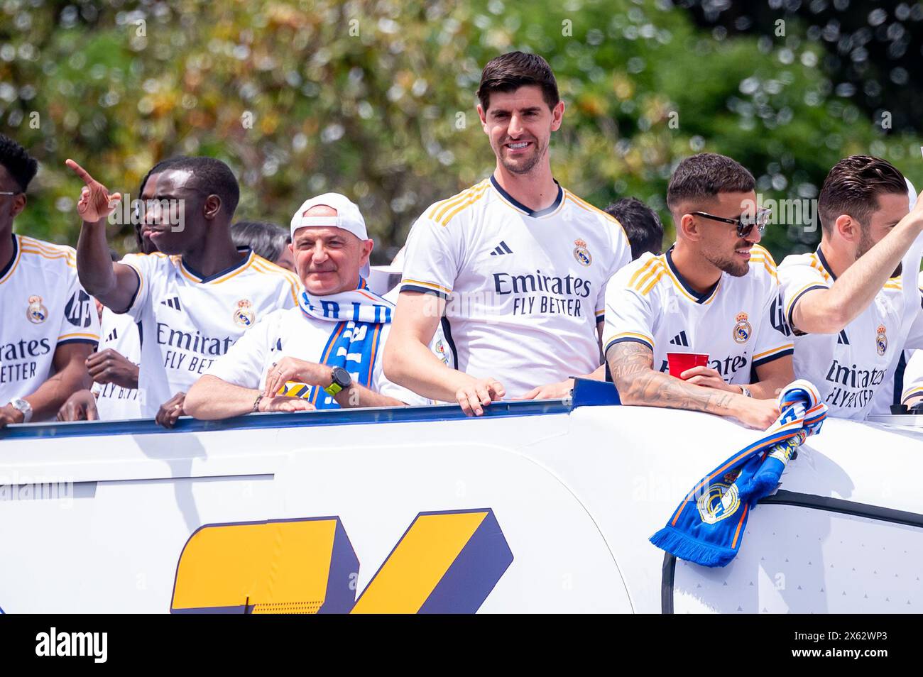Madrid, Madrid, Spain. 12th May, 2024. MADRID, SPAIN - MAY 12: The open top bus with the Real Madrid players (from L to R) Ferland Mendy, Thibaut Courtois, Dani Ceballos seen arriving during the Real Madrid Celebration of The La Liga Title at Plaza de Cibeles on May 12, 2024 in Madrid, Spain. (Credit Image: © Alberto Gardin/ZUMA Press Wire) EDITORIAL USAGE ONLY! Not for Commercial USAGE! Credit: ZUMA Press, Inc./Alamy Live News Stock Photo
