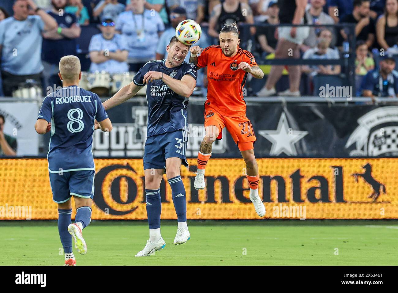 Kansas City, KS, USA. 11th May, 2024. Sporting Kansas City defender Andreu Fontas (3) heads the ball in front of Houston Dynamo FC midfielder Sebastian Kowalczyk (27) at Children's Mercy Park in Kansas City, KS. David Smith/CSM (Corrects for an earlier version with an incorrect date. (Credit Image: © David Smith/Cal Sport Media). Credit: csm/Alamy Live News Stock Photo