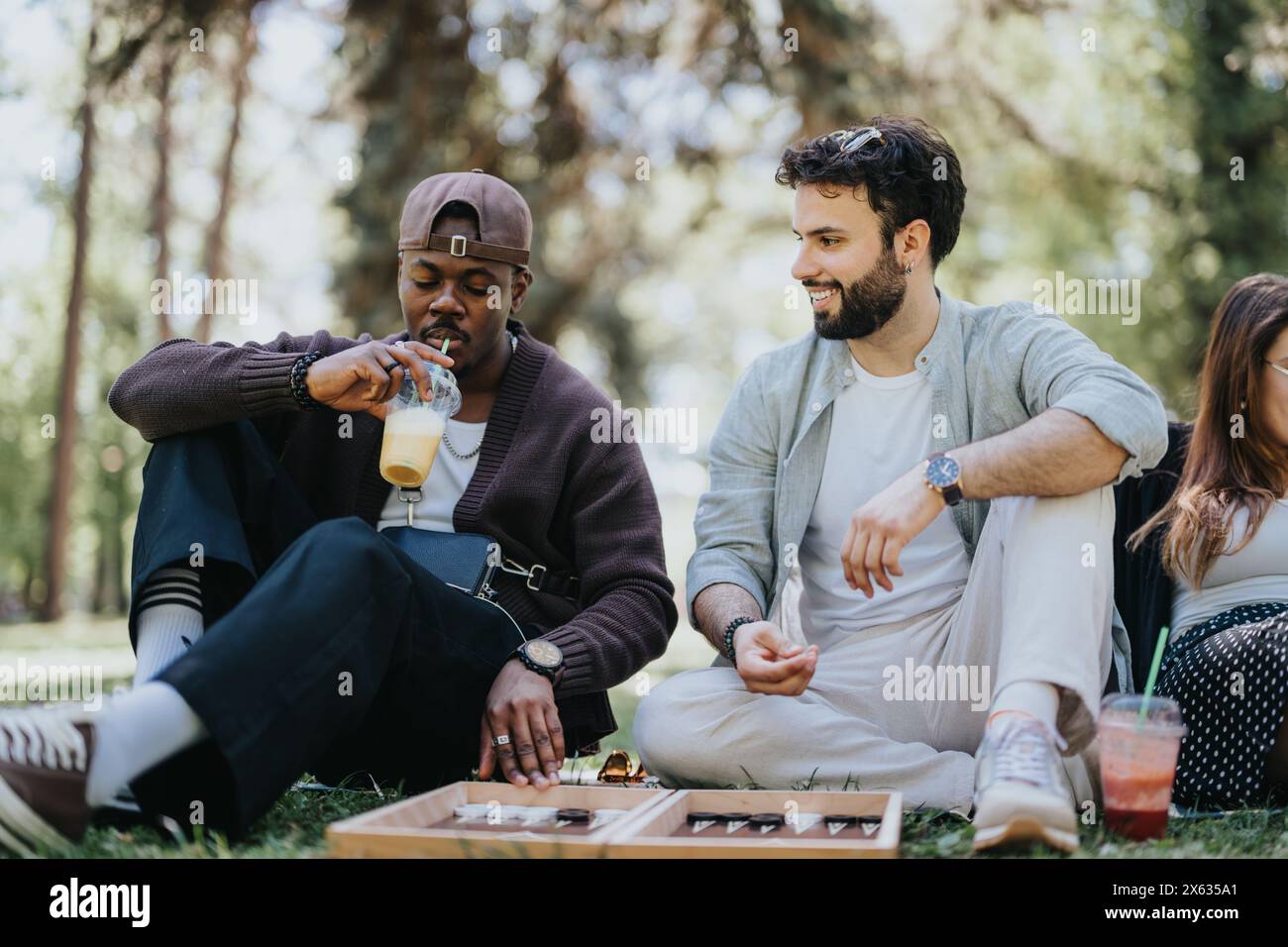 Gathering multiracial people playing board hi-res stock photography and ...