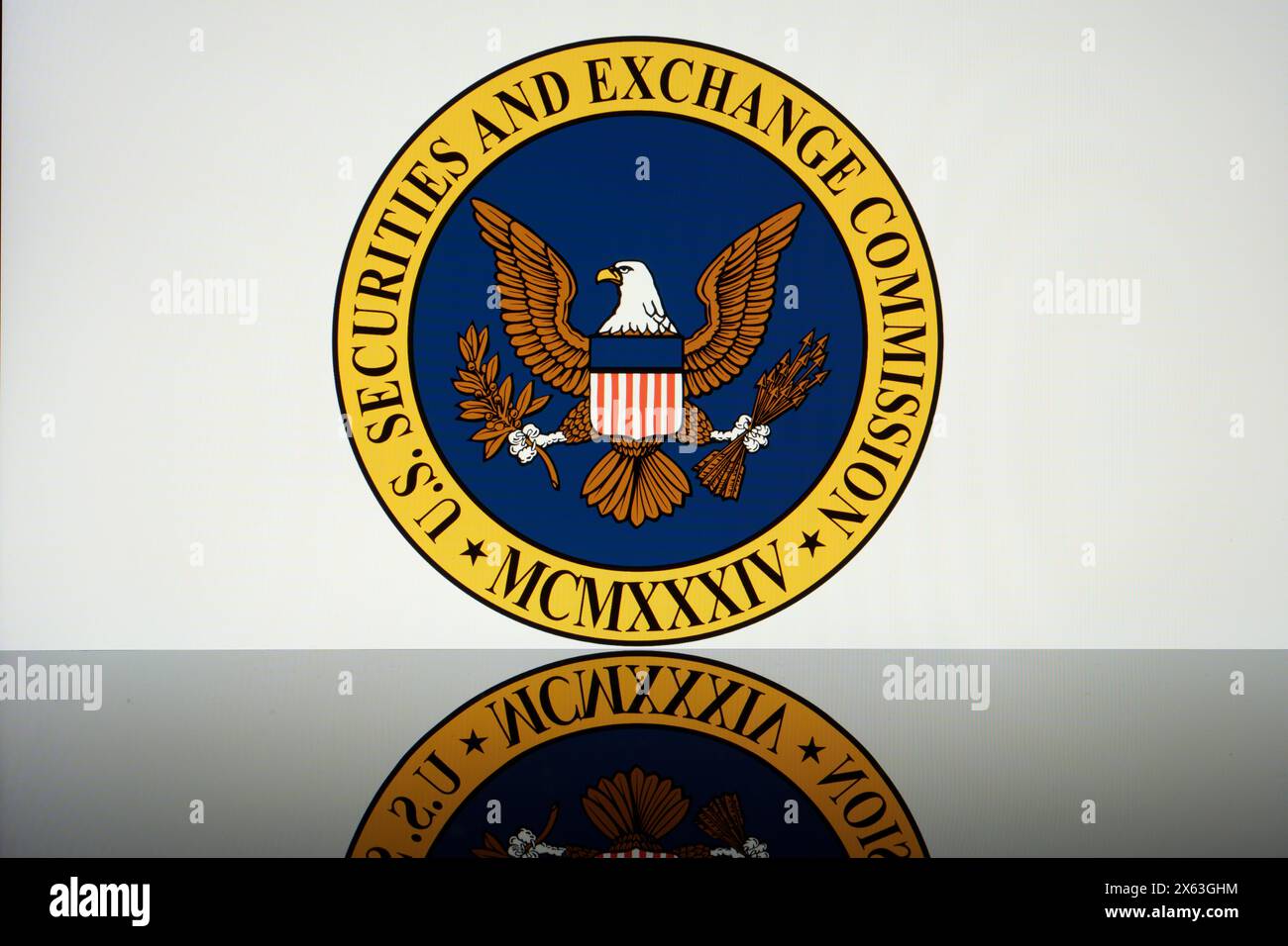 US Securities and Exchange Commision logo seen on the screen and its reflection. Stafford, United Kingdom, April 28, 2024 Stock Photo
