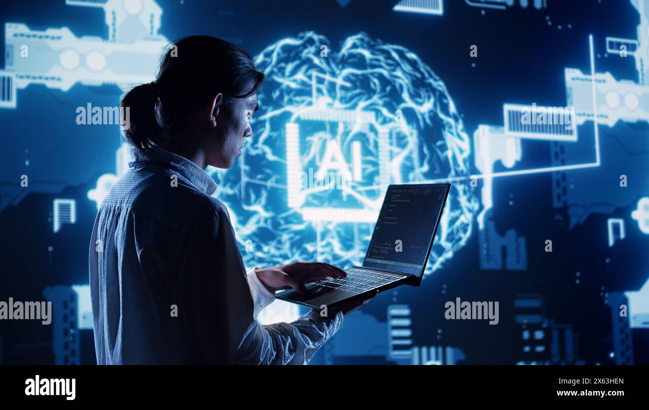 System admin in data center running programming scripts on laptop, solving tasks. Certified developer manipulating lines of code for artificial intelligence applications development Stock Photo