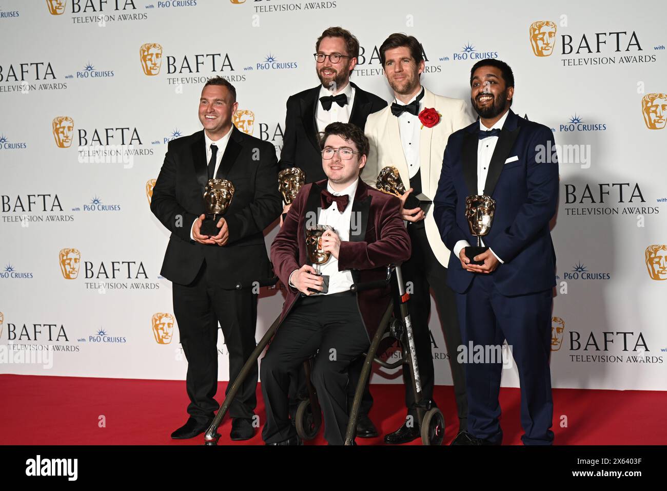 Royal Festival Hall, LONDON, ENGLAND, UK - MAY 12 2024: Jack Carroll (C) and production crew pose with the Short Form Award for 'Mobility' in the Winners Room during the 2024 BAFTA Television Awards with P&O Cruises, London, UK. Credit: See Li/Picture Capital/Alamy Live News Stock Photo