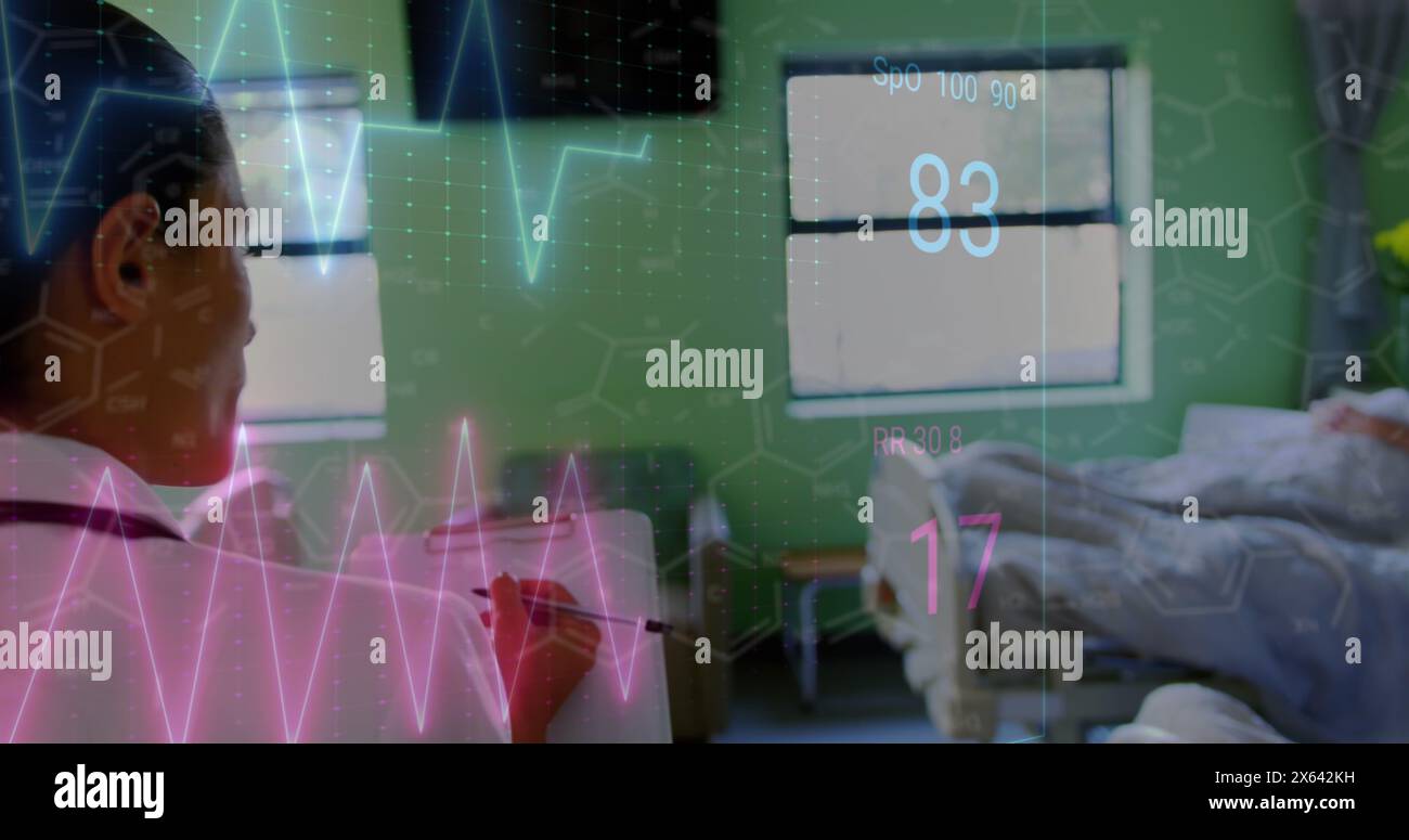 Image of heart rate monitor over biracial female healthworker with clipboard walking in hospital Stock Photo