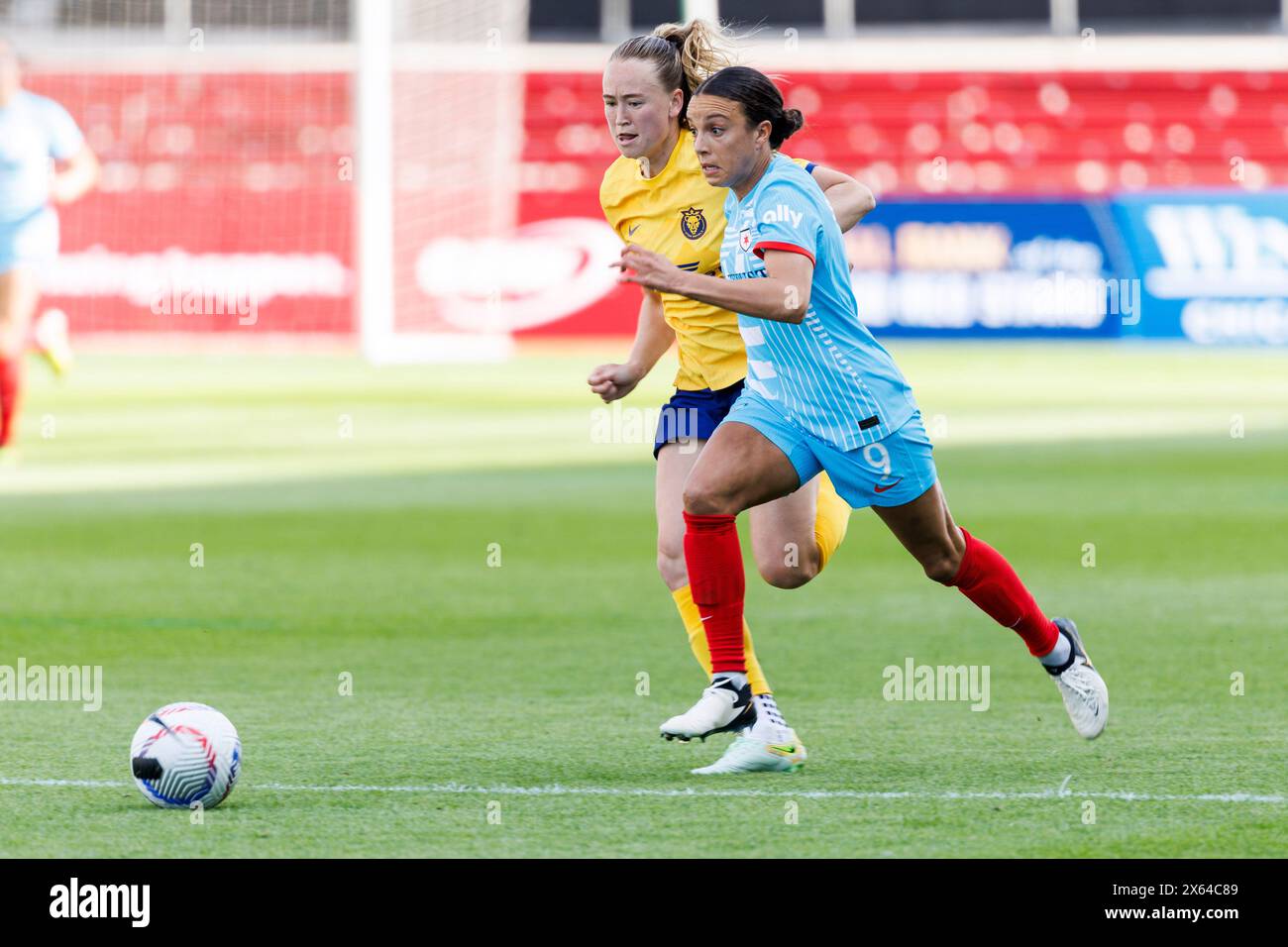Bridgeview, Illinois, USA. 12th May, 2024. Chicago Red Stars forward Mallory Swanson (9) and Utah Royals FC defender Olivia Griffitts (3 battle for the ball during NWSL Soccer match action between the Utah Royals FC and Chicago Red Stars at SeatGeek Stadium in Bridgeview, Illinois. John Mersits/CSM/Alamy Live News Stock Photo