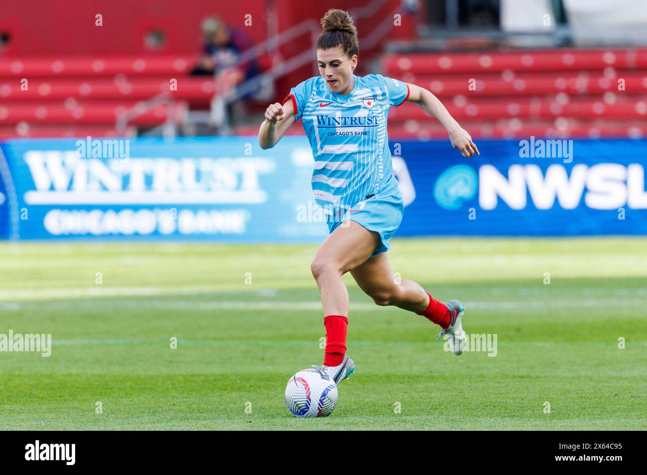 Bridgeview, Illinois, USA. 12th May, 2024. Chicago Red Stars midfielder Cari Roccaro (4) dribbles the ball up field during NWSL Soccer match action between the Utah Royals FC and Chicago Red Stars at SeatGeek Stadium in Bridgeview, Illinois. John Mersits/CSM/Alamy Live News Stock Photo