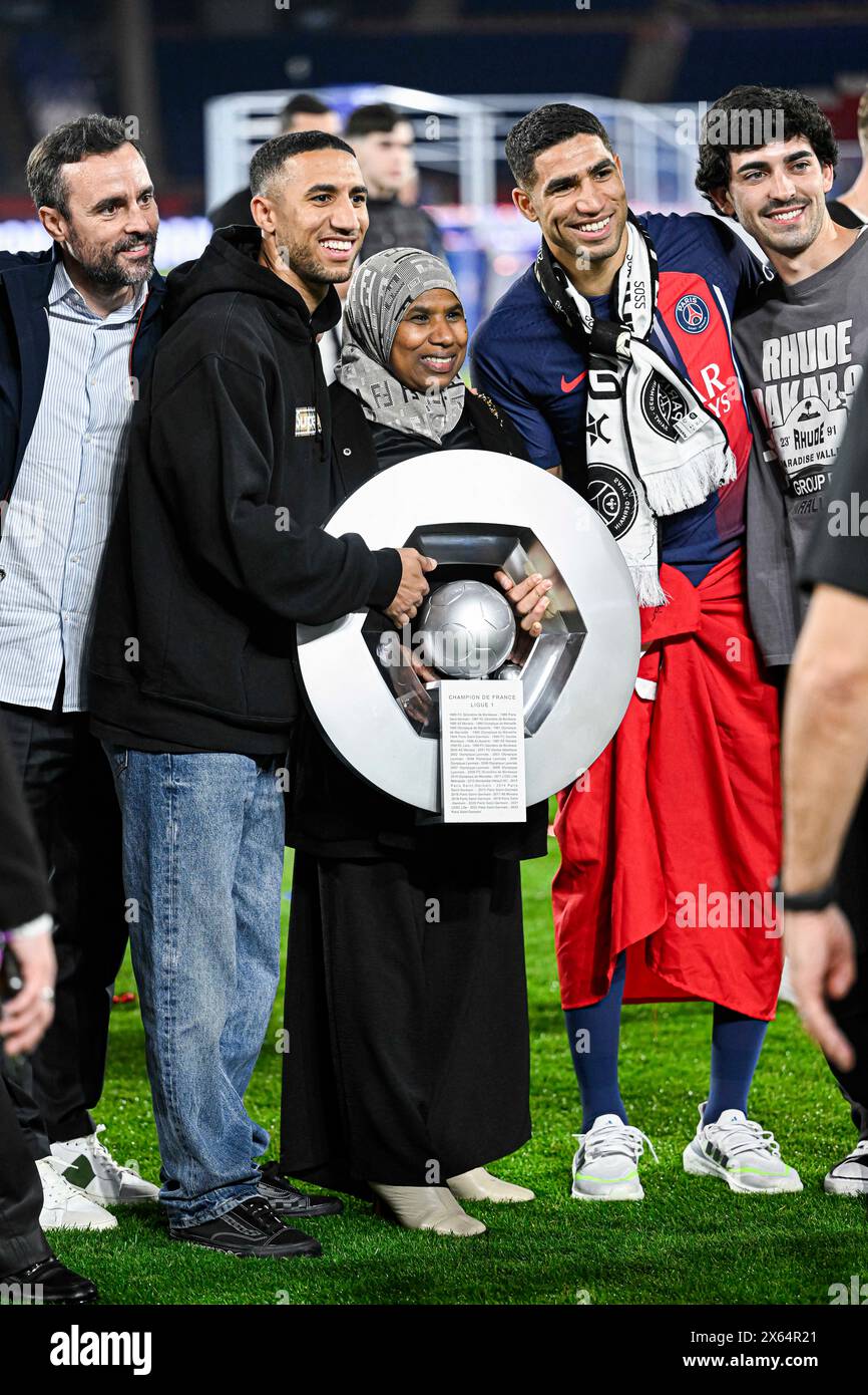 Paris, France. 12th May, 2024. Achraf Hakimi his brother Nabil and his mother Saida Mouth during