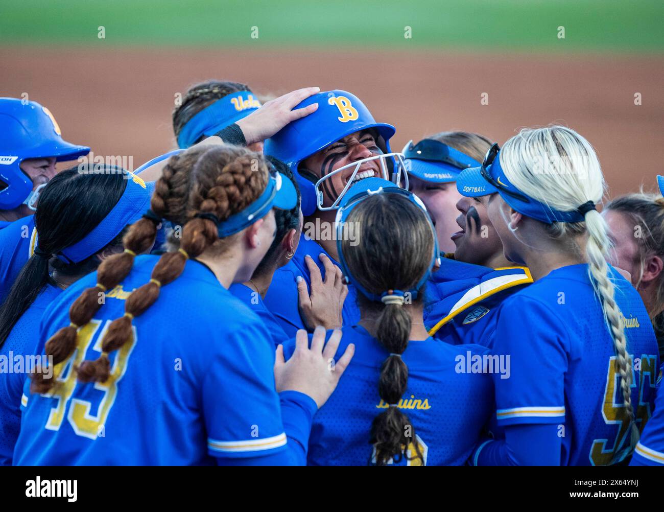 May 11 2024 Palo Alto CA U.S.A. UCLA infielder Jordan Woolery (15)hits a solo home run in the bottom of the second inning, celebrates with her team at home plate during the NCAA Pac 12 Softball Tournament Championship between UCLA Bruins and the Utah Utes. UCLA beat Utah 2-1 at Boyd & Jill Smith Family Stadium Palo Alto Calif. Thurman James/CSM (Credit Image: © Thurman James/Cal Sport Media) Stock Photo