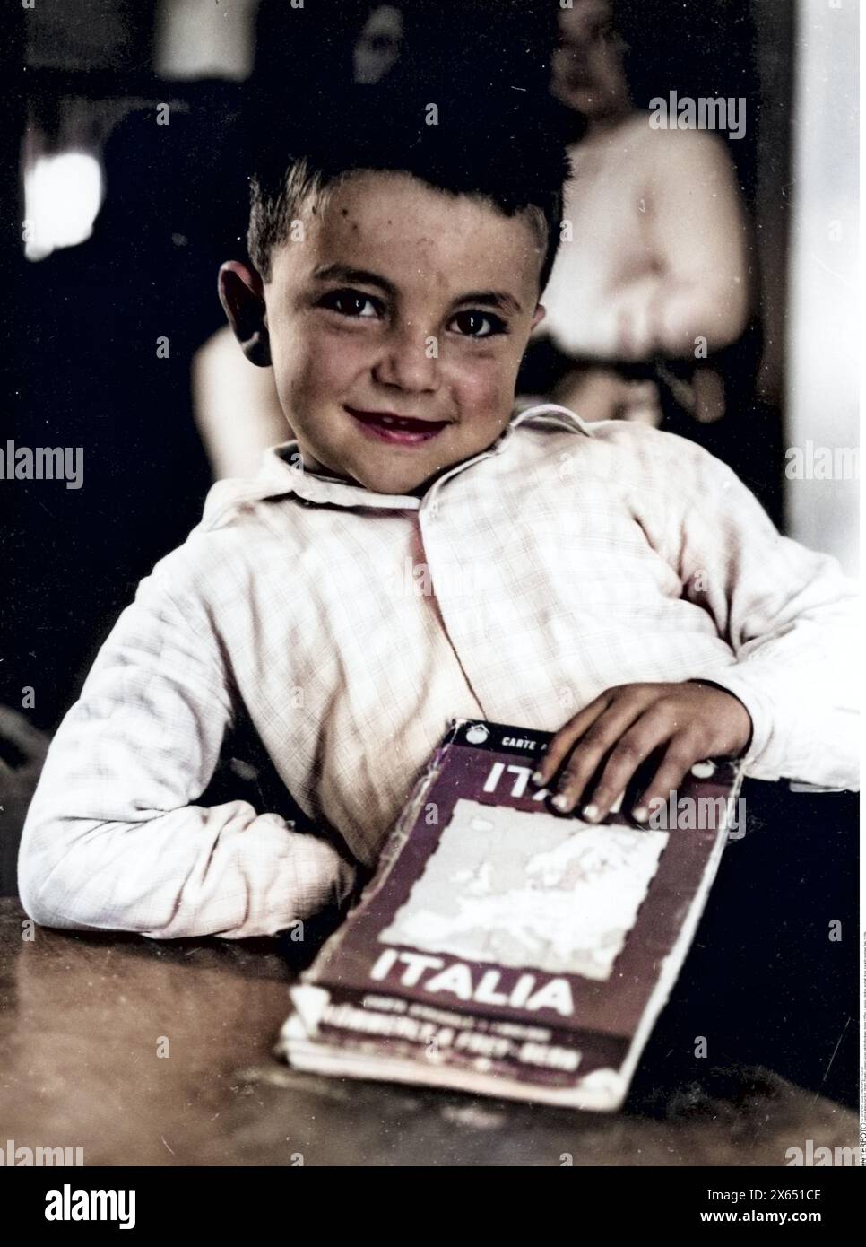 people, children, portrait - boys, boy with roadmap, Italy, 1950s, ADDITIONAL-RIGHTS-CLEARANCE-INFO-NOT-AVAILABLE Stock Photo