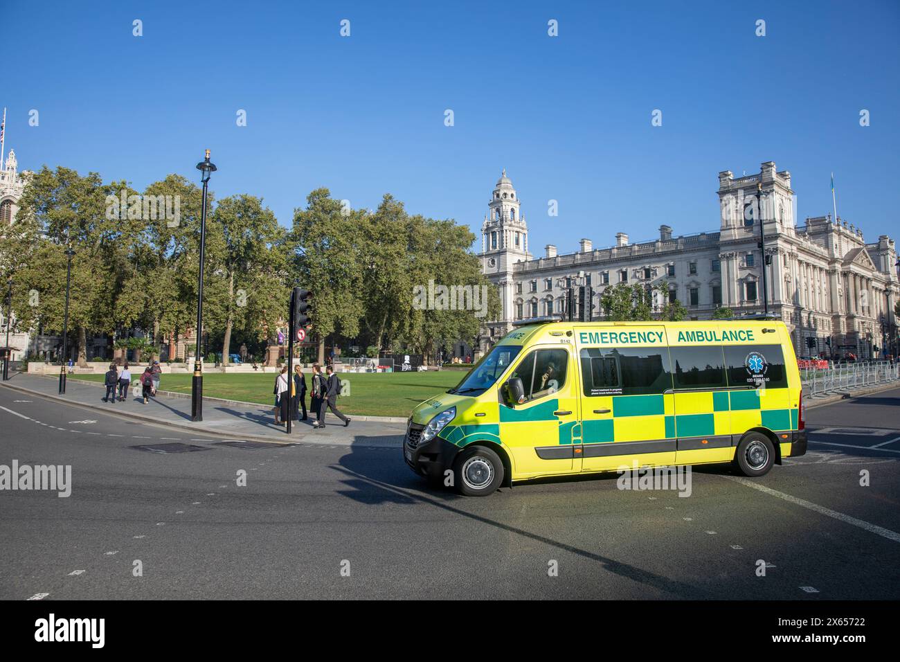 London, NHS ambulance travelling around Parliament Square in ...